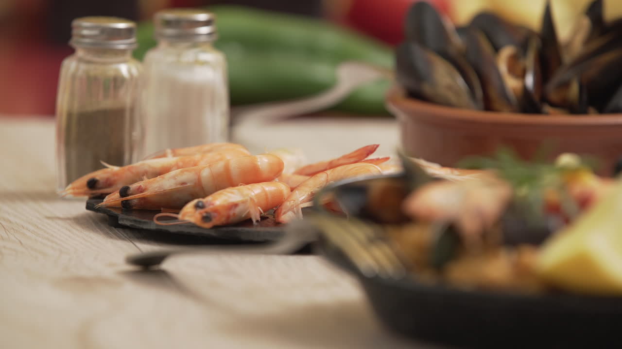 Paella traditional Spanish food, served on tapa plate