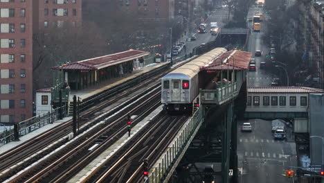 b-roll of the 1 train passing through harlem. shot on a winter day in 4k.