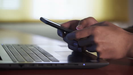 using a phone and laptop