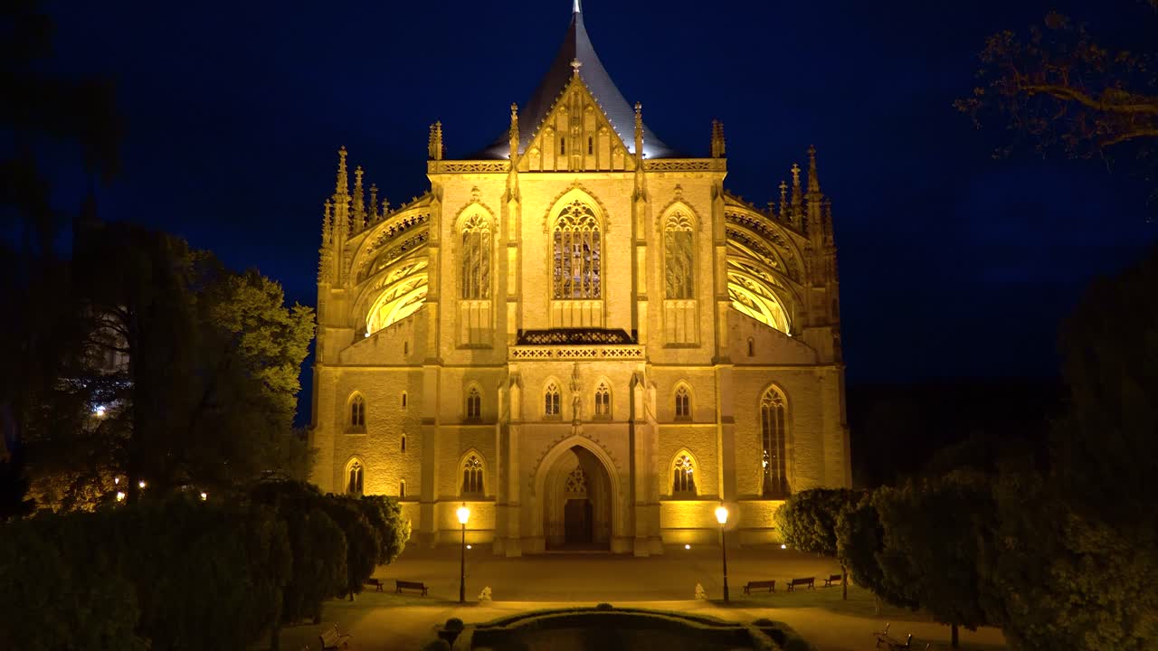 front view of Saint Barbara's Church, Kutna Hora, Czechia at nigh, tilt up