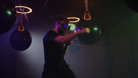 man using vr headset for virtual boxing training in a gym