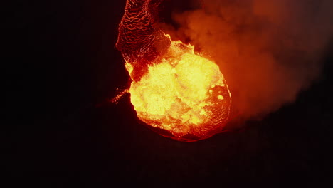 Aerial-birds-eye-overhead-top-down-view-of-boiling-lava-in-volcano-crater.-Erupting-of-glowing-molten-material.-Fagradalsfjall-volcano.-Iceland,-2021