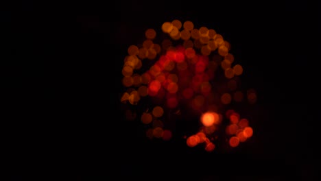 red and gold circle fireworks with bokeh. holiday background