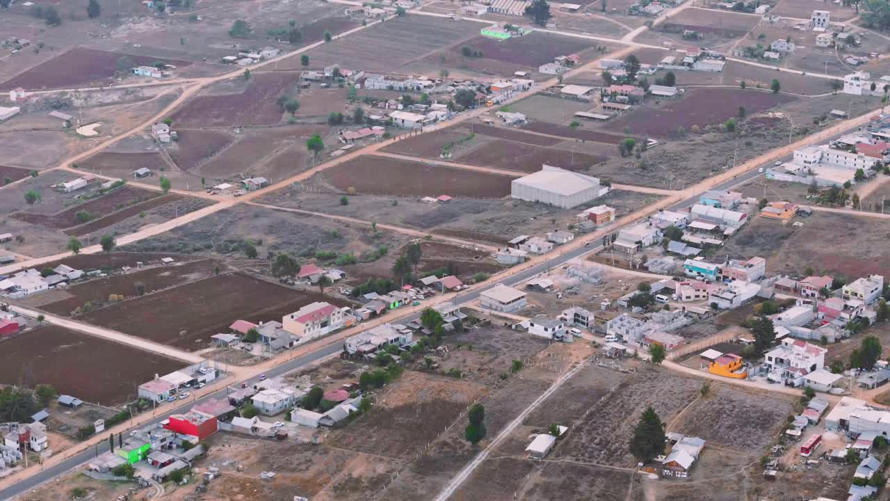 Chalcatongo, oaxaca, showing rural roads, houses, and farmland, aerial view