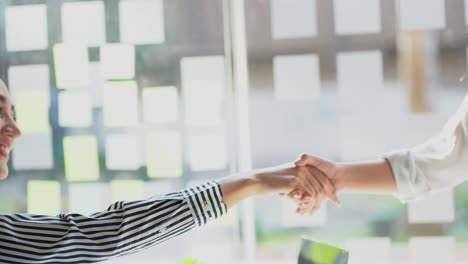 young asian woman interviewer and interviewer handshake job interview concept greeting handshake in business cooperation agreement successful businesswomen shaking hands after a good deal