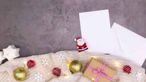 blinking lights on christmas decoration with paper and envelope for text. stop motion