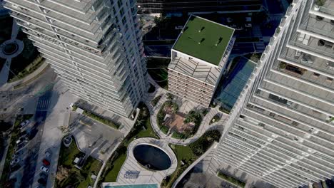 descending drone footage close to high-rise apartment towers in puerto madero, buenos aires