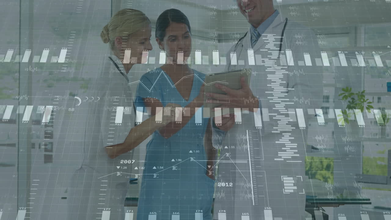 Medical team reviewing tablet data in medical office, showing animated health charts and graphs