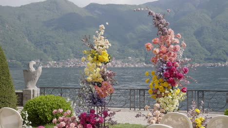colorful floral wedding decorations by the lake