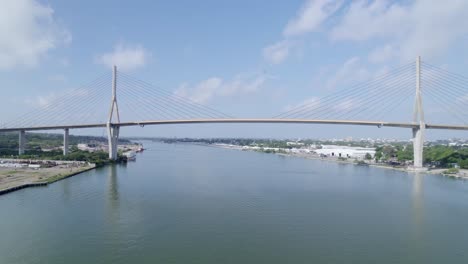 moving forward and passing under the suspension bridge