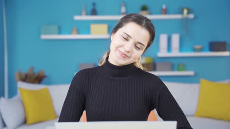 Portrait-of-young-entrepreneur-woman-working-in-her-home-office.