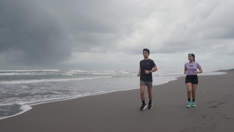 couple running on a beach