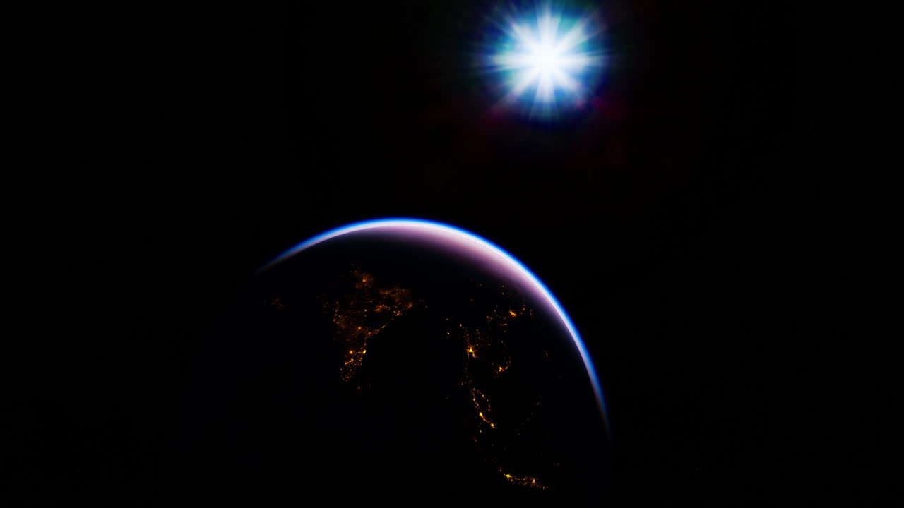 View of earth from space with sunlight illuminating the atmosphere