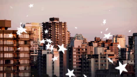 animation of falling white stars over cityscape