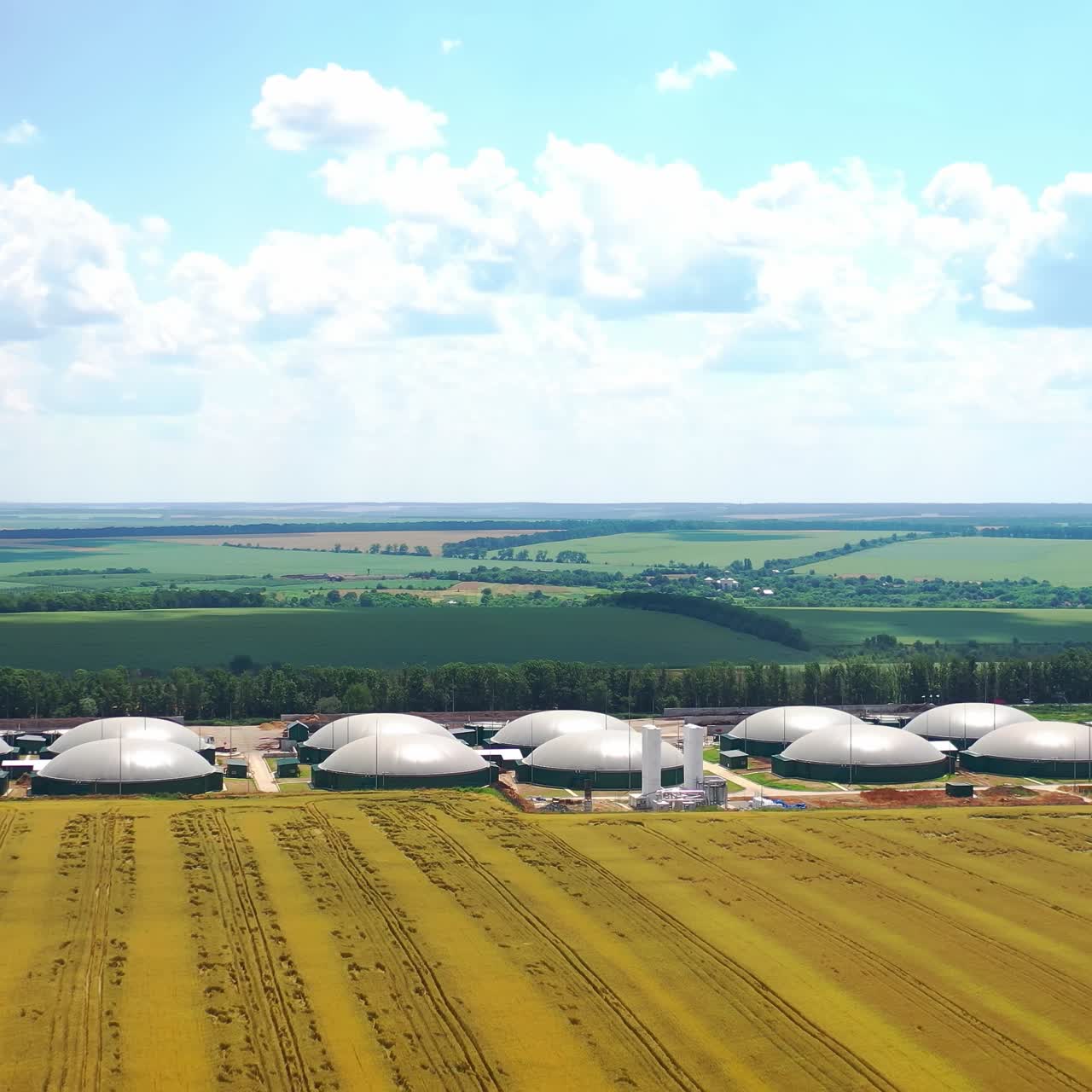Bio gas station. Modern biofuel factory. Aerial view on biofuel plant. Ecological production concept. Video from above