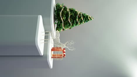 christmas tree, illuminated reindeer, and wrapped gift on white background vertical