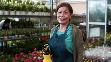 female gardener posing indoors