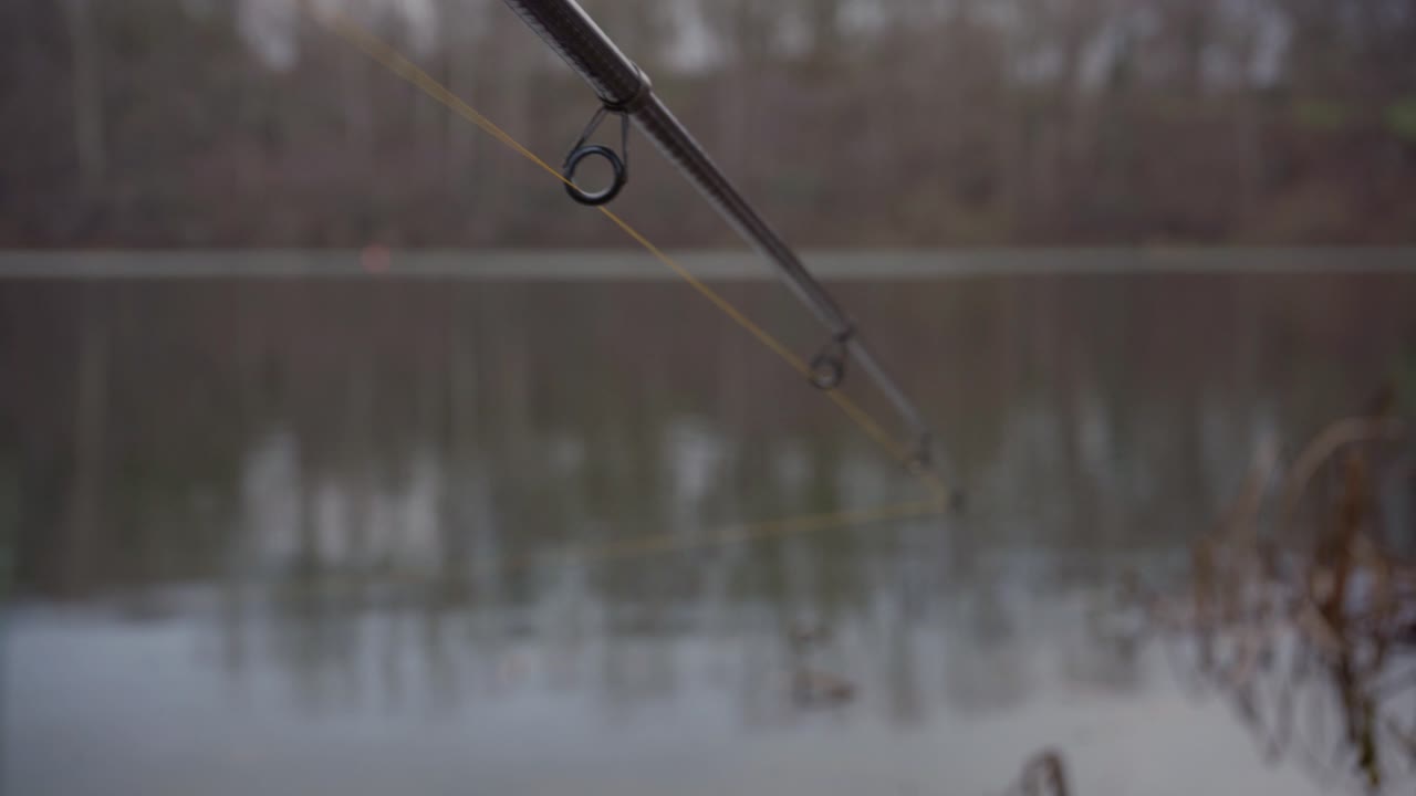 POV Fishing Adventure: Reeling in Carbon Rod at Lakeside