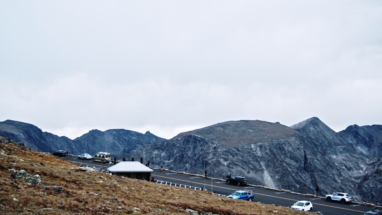 Slow pan over mountainous road over beautiful rocks montans