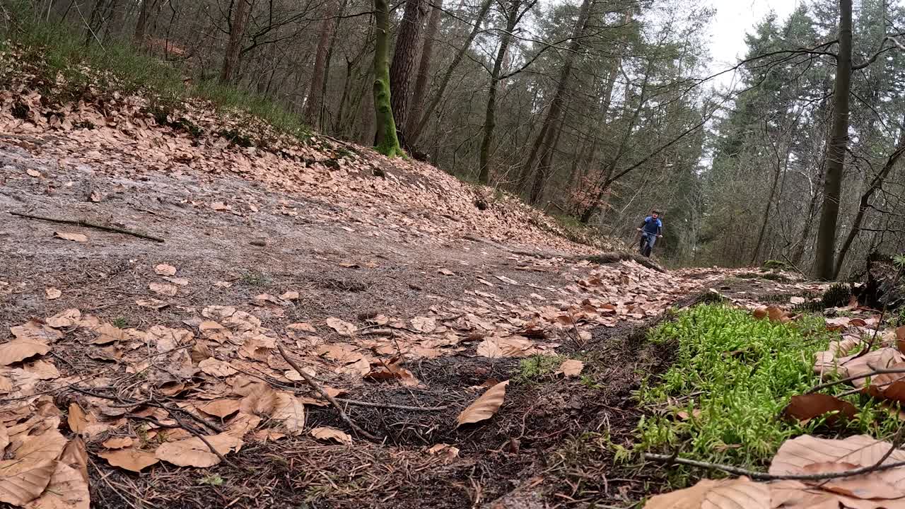 Video of mountain bike rider riding by