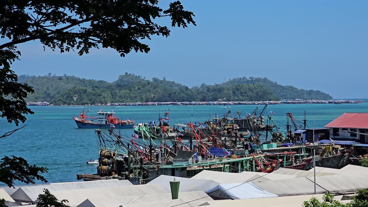 Colorful Fishing Trawlers Tied In Front Of Kota Kinabalu Fish Market In Sabah, Malaysia. Wide Shot