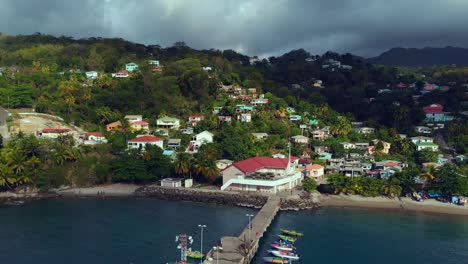 drone view of a fishing village along the coast of the caribbean island of grenada