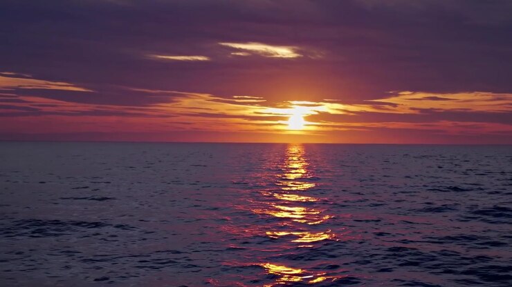 Golden Sunset Over Calm Ocean Waves
