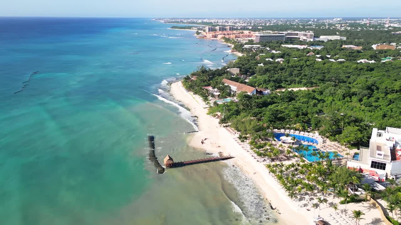 Aerial view of Playa Xcalacoco beach, Mexico, sunlit and scenic