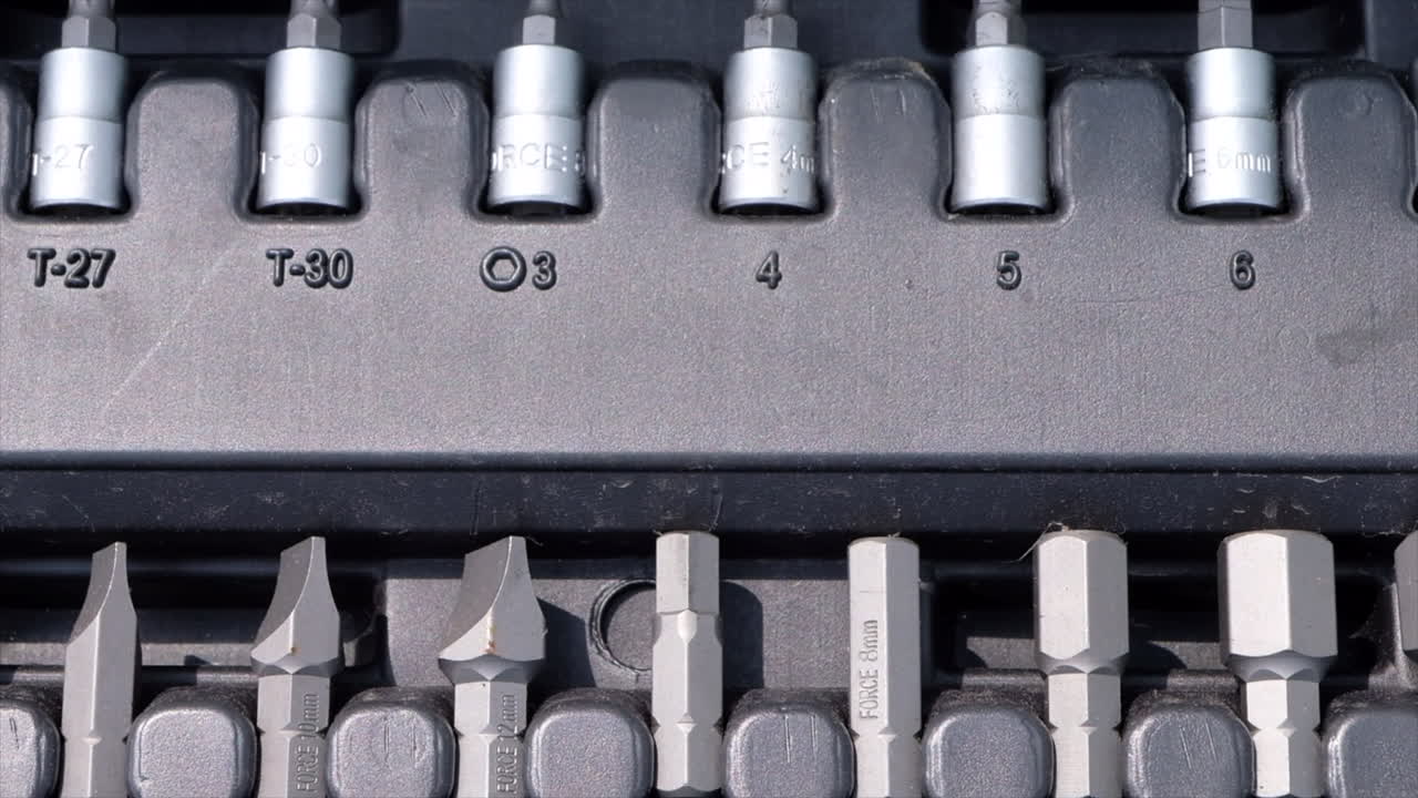 Close up of a socket wrench set with multiple sizes