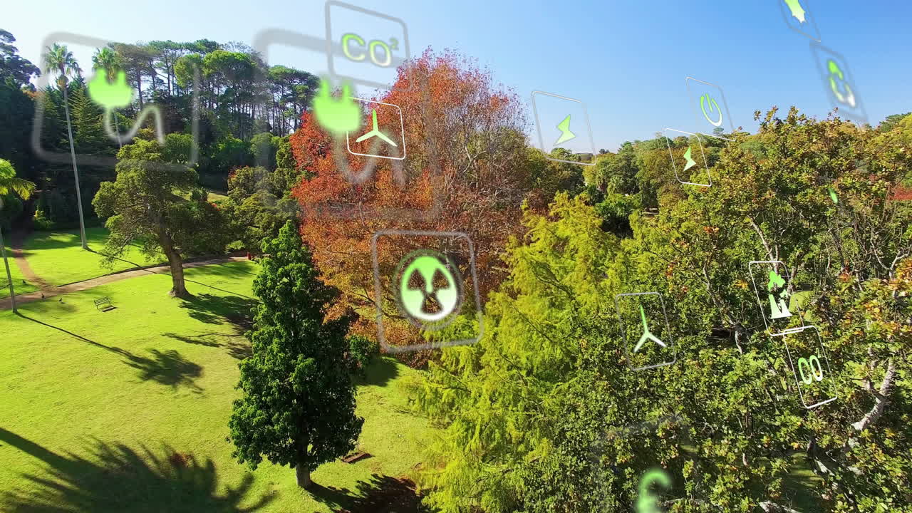 Animation of eco-friendly icons floating over lush green park with trees