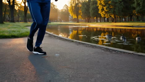 person running in a park at sunrise