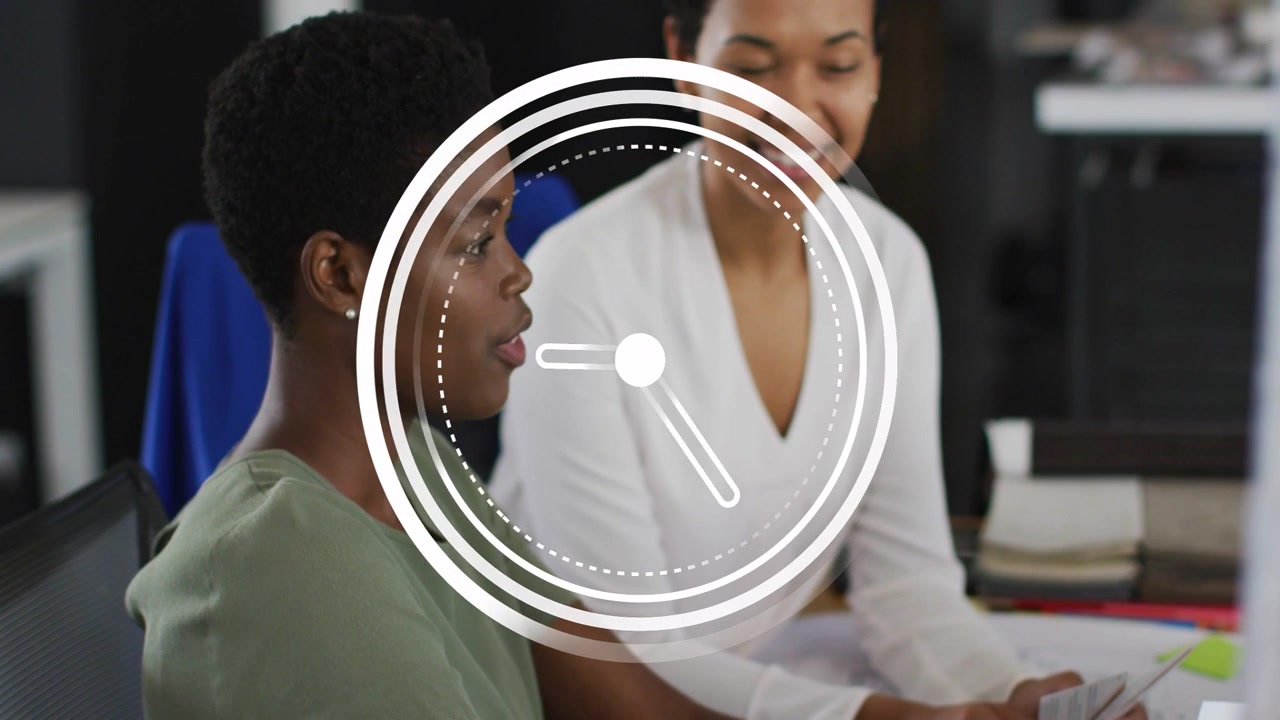 Animated clock appearing and rotating, initiating 2 women collaborating in office using PC and docs