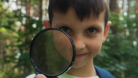 young boy in the forest