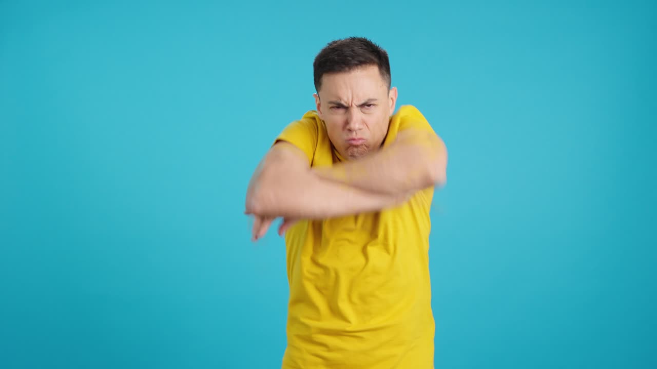 Annoyed man with crossed arms