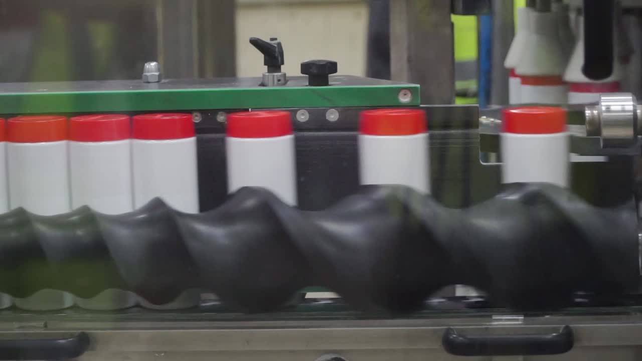 línea automatizada de envasado de botellas