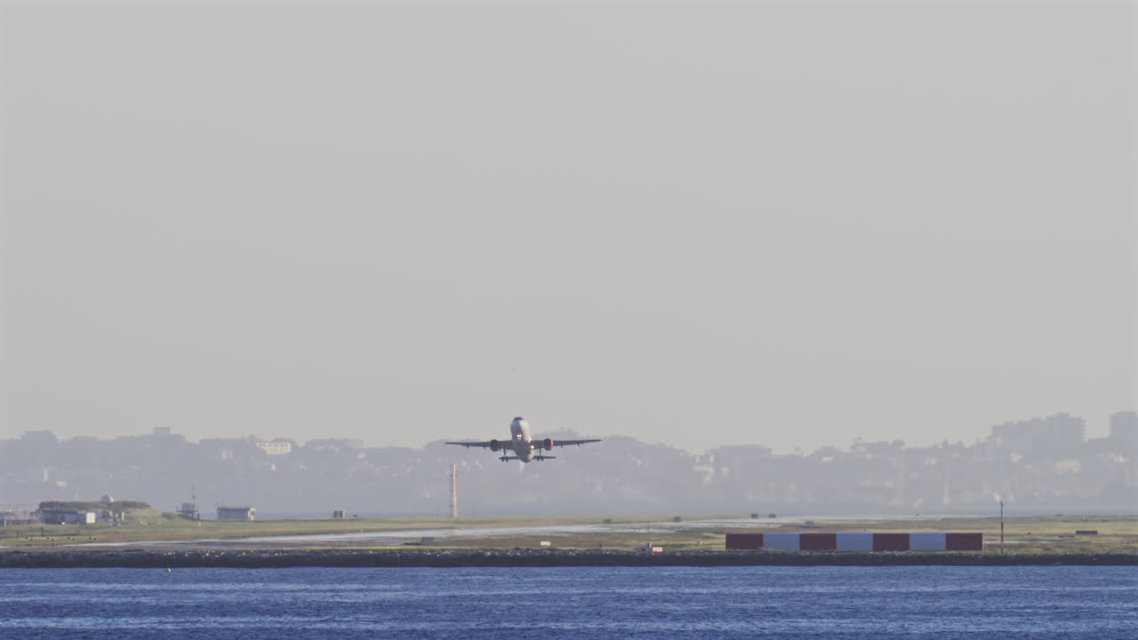 Airplane departing from the Nice Cote d'Azur Airport, France in daylight