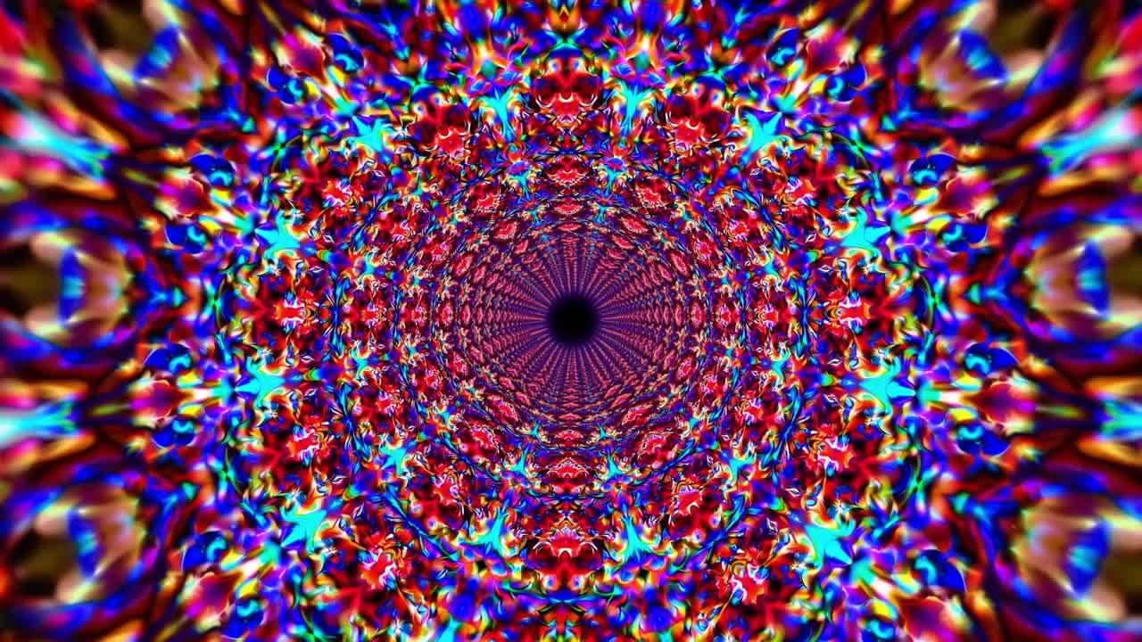 Colorful kaleidoscopic patterns swirl and evolve in a mesmerizing motion sequence, creating a vibrant visual experience that captivates the viewer's attention and imagination