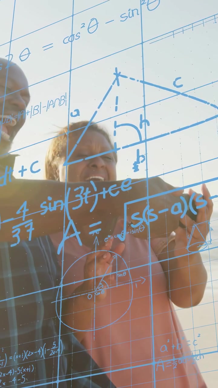 Vertical video: Man embracing woman backlit while woman tapping phone, starting STEM grid overlay