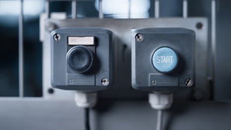 factory machine stop button on technological manufacture automat panel closeup