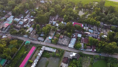 Footage-of-a-slum-town-in-Bangladesh,-captured-from-an-aerial-perspective-with-a-soft-light-and-a-zooming-out-effect