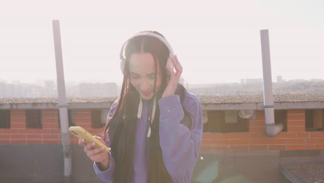 brunette woman on a terrace