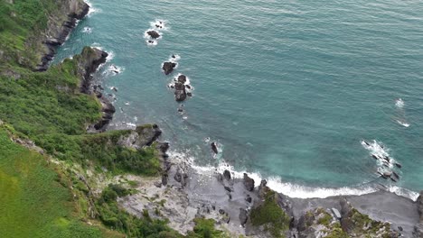 drone flight over the torrs cliffs and rugged coastline – ilfracombe, devon, uk