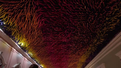 traditional mexican plastic paper decorating the street at night