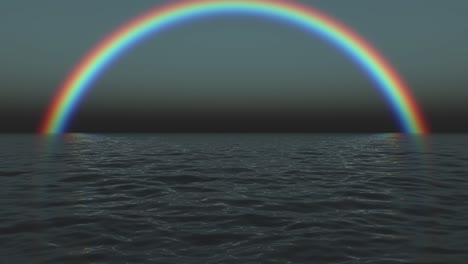 el arco iris sobre un océano oscuro