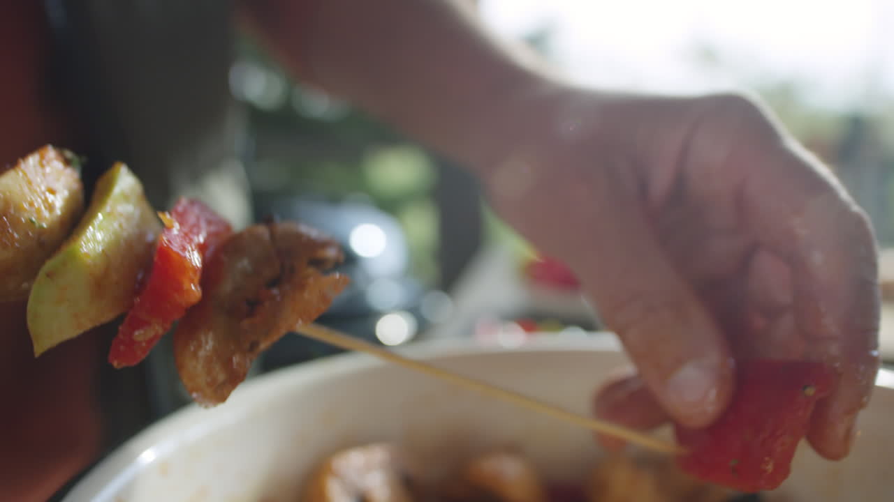 Threading Veggies onto Skewer for BBQ