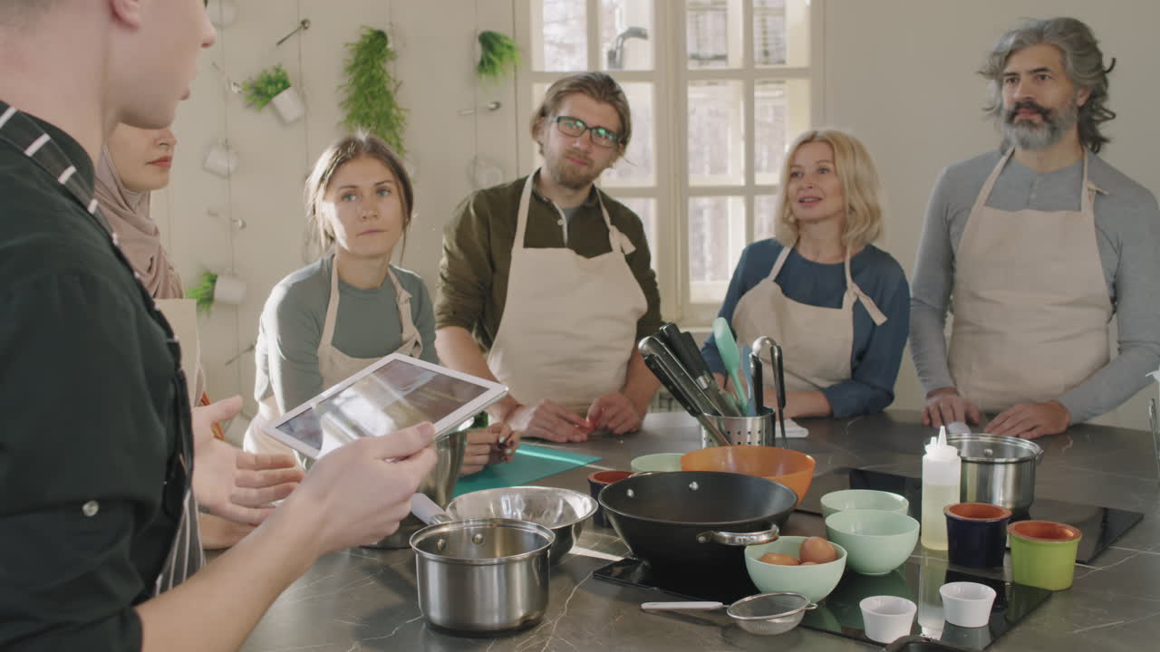 Group Of People At Cooking Master Class