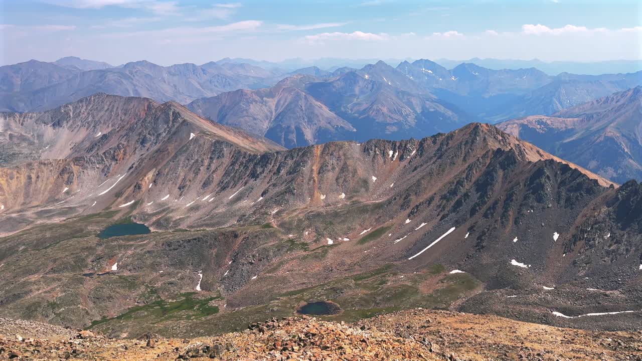 Summer summit of 14er La Plata Peak view Collegiate Peaks Sawatch Range spring summer Rocky Mountains Colorado North Apostle Mt Columbia Oxford Yale Harvard above treeline morning blue sky pan left