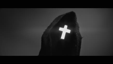 masked man with cross of light glowing on his face moves his head up