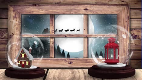 Animation-of-two-snow-globes-with-house-and-lantern-and-winter-scenery-with-santa-claus-in-sleigh