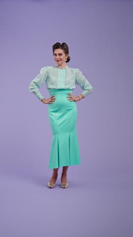 elegant woman in retro-inspired outfit on purple background